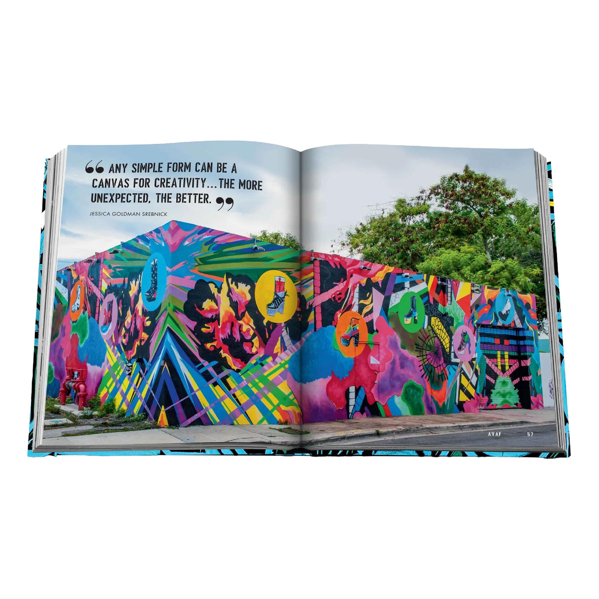 Street Art Icons book open to a photograph of a colorful Wynwood Walls mural