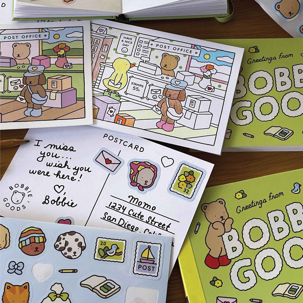 Colored postcard scenes from Bobbie Goods postcard coloring book