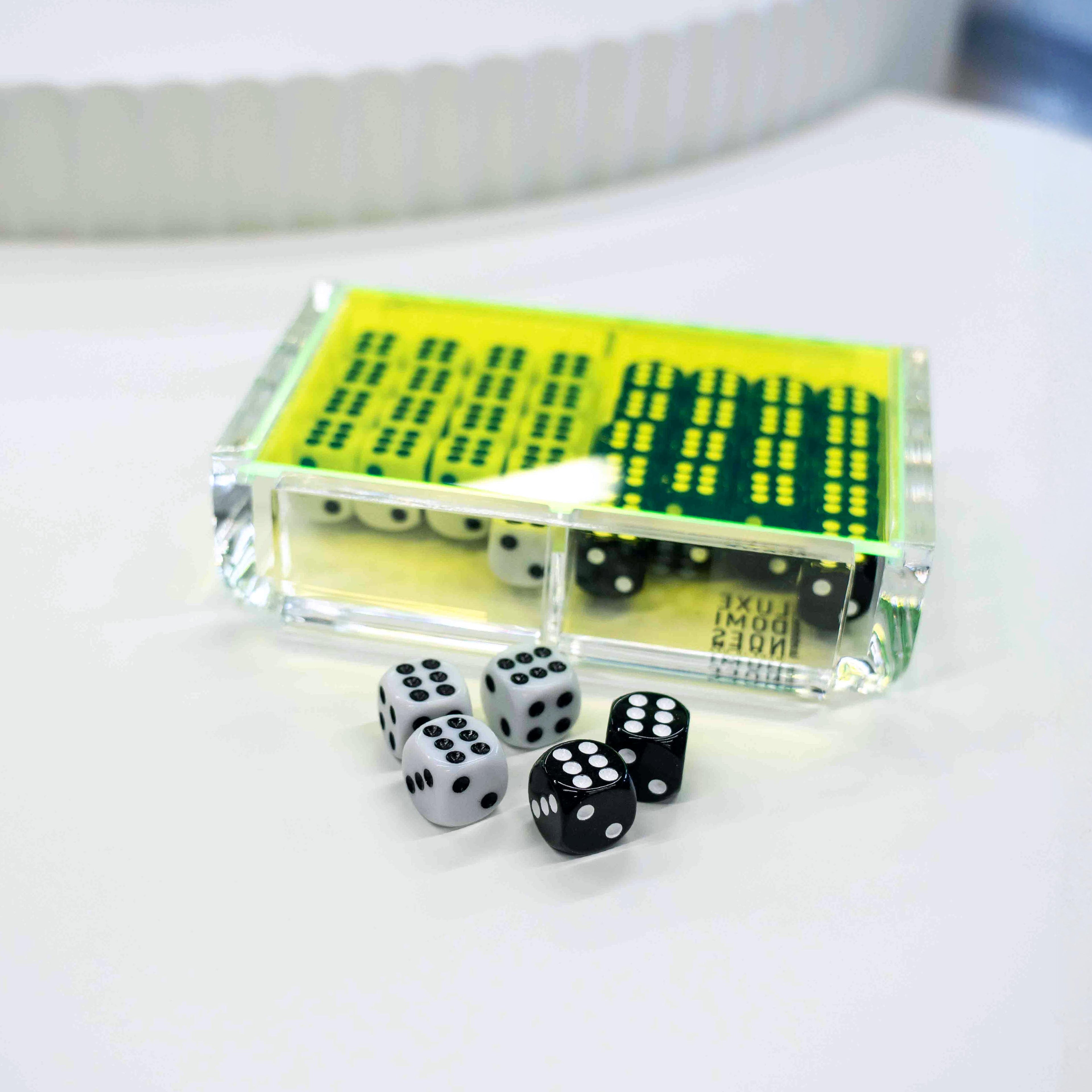 El Dado Luxe dice case with neon green lid holding 40 dice