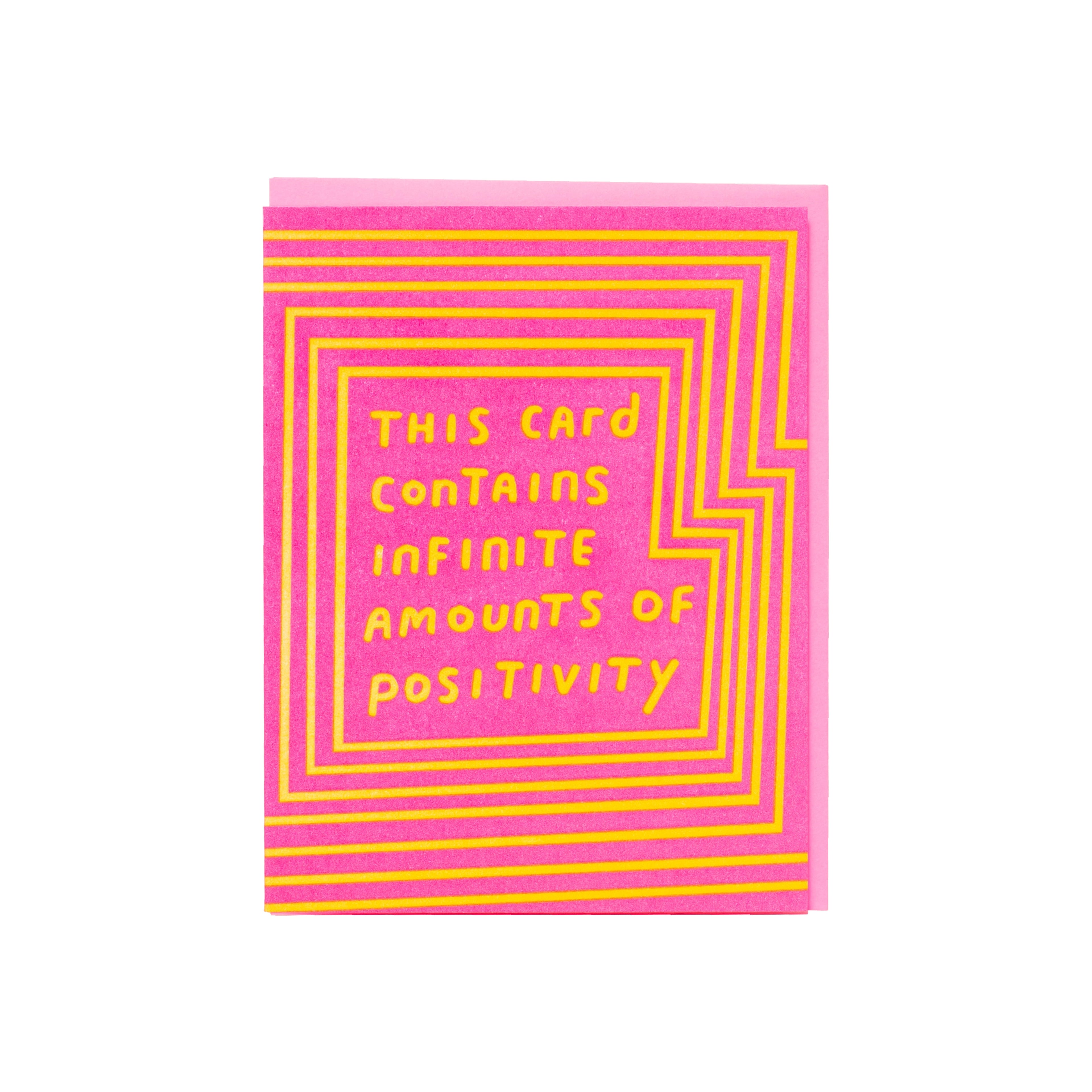 Pink greeting card with yellow geometric lines and text reading ‘This card contains infinite amounts of positivity.’