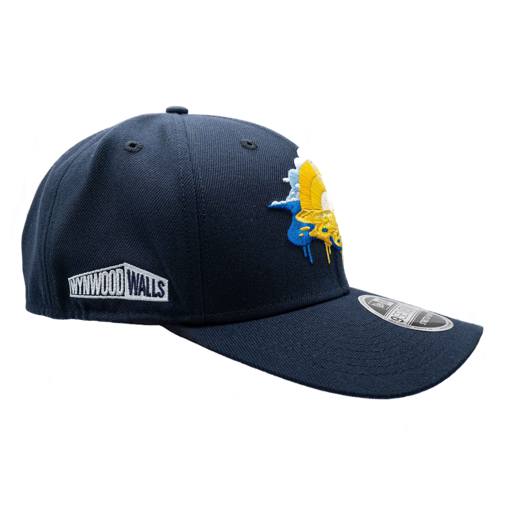 Navy blue cap with a colorful logo on a white background