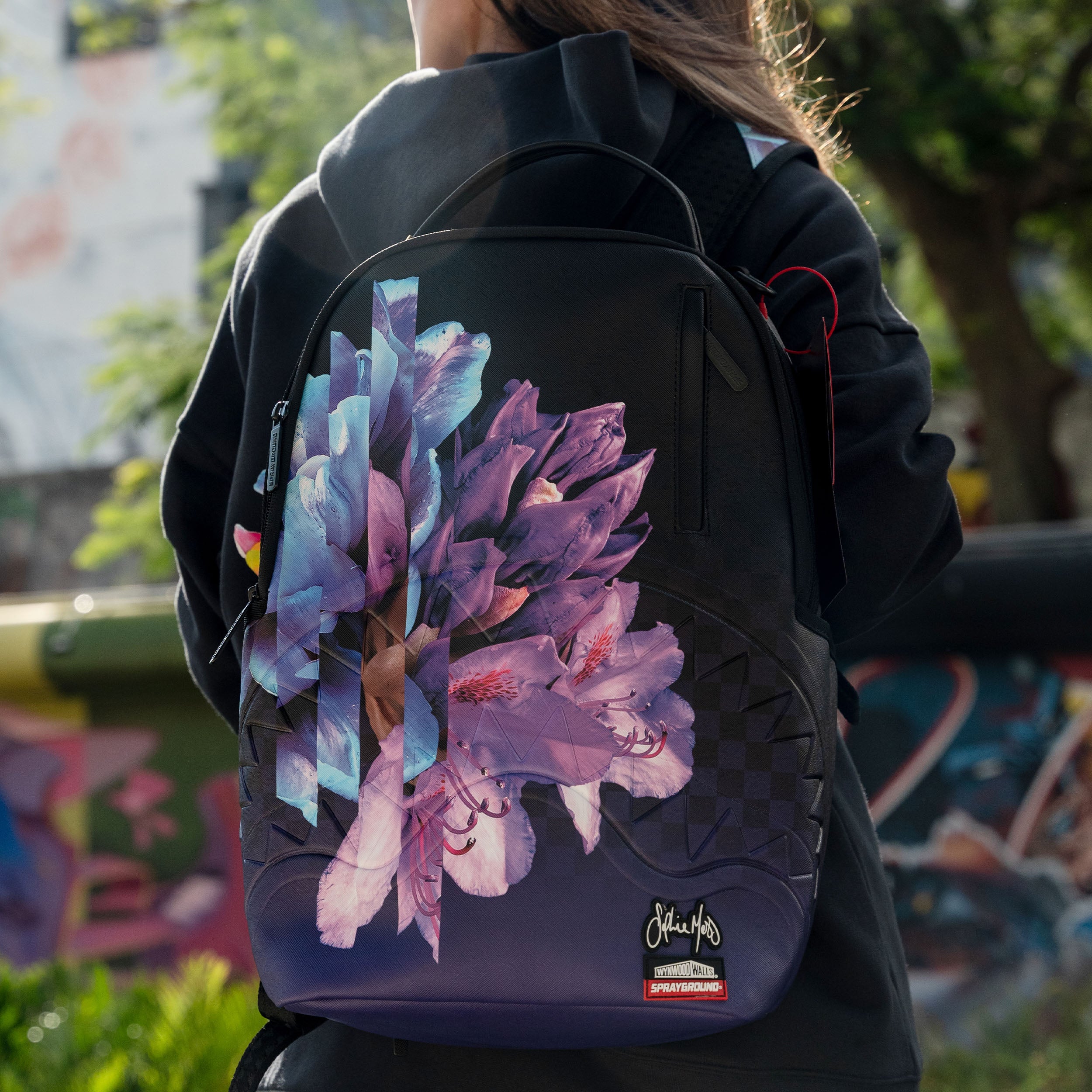 Purple sprayground backpack online