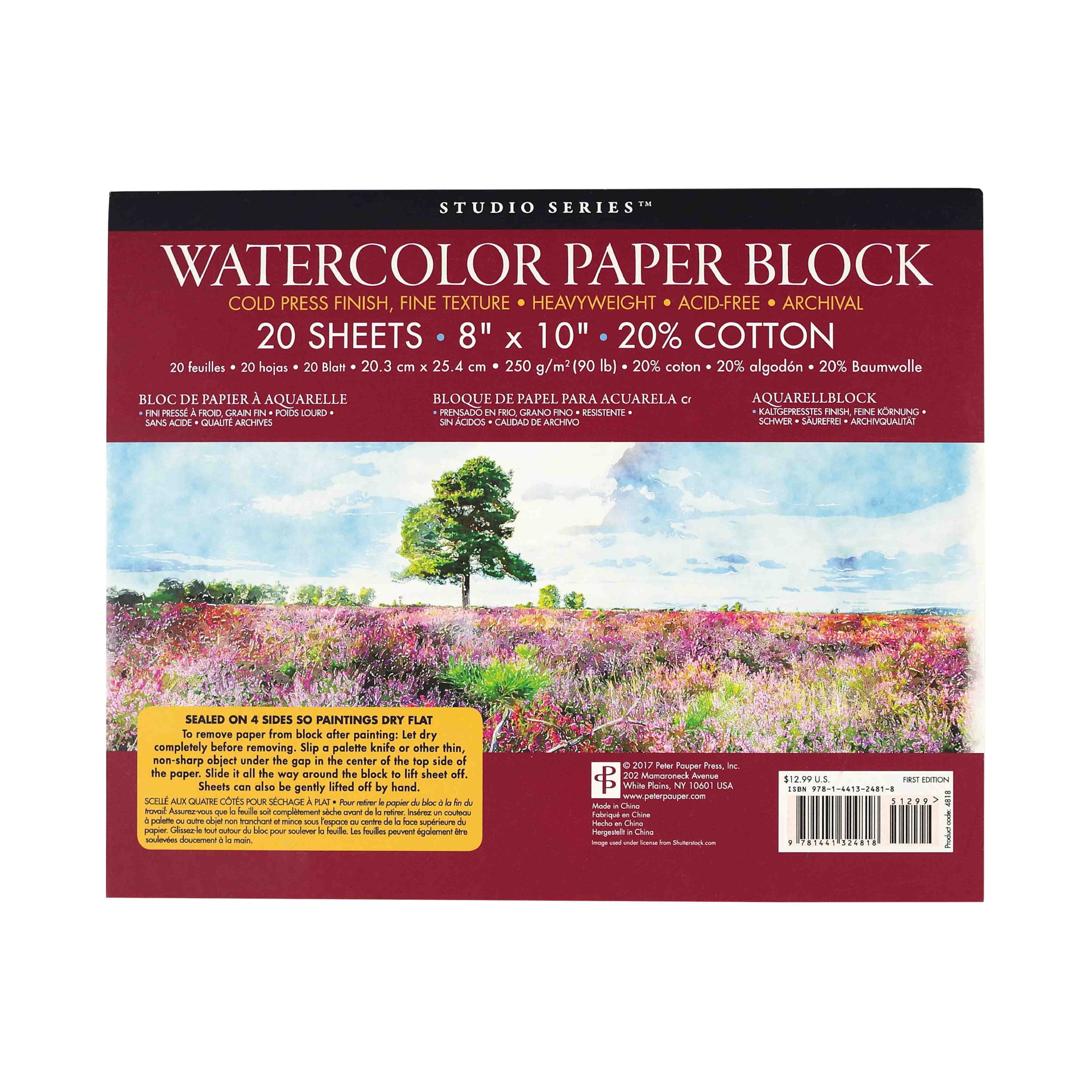 Watercolor paper block packaging with a scenic illustration on a white background