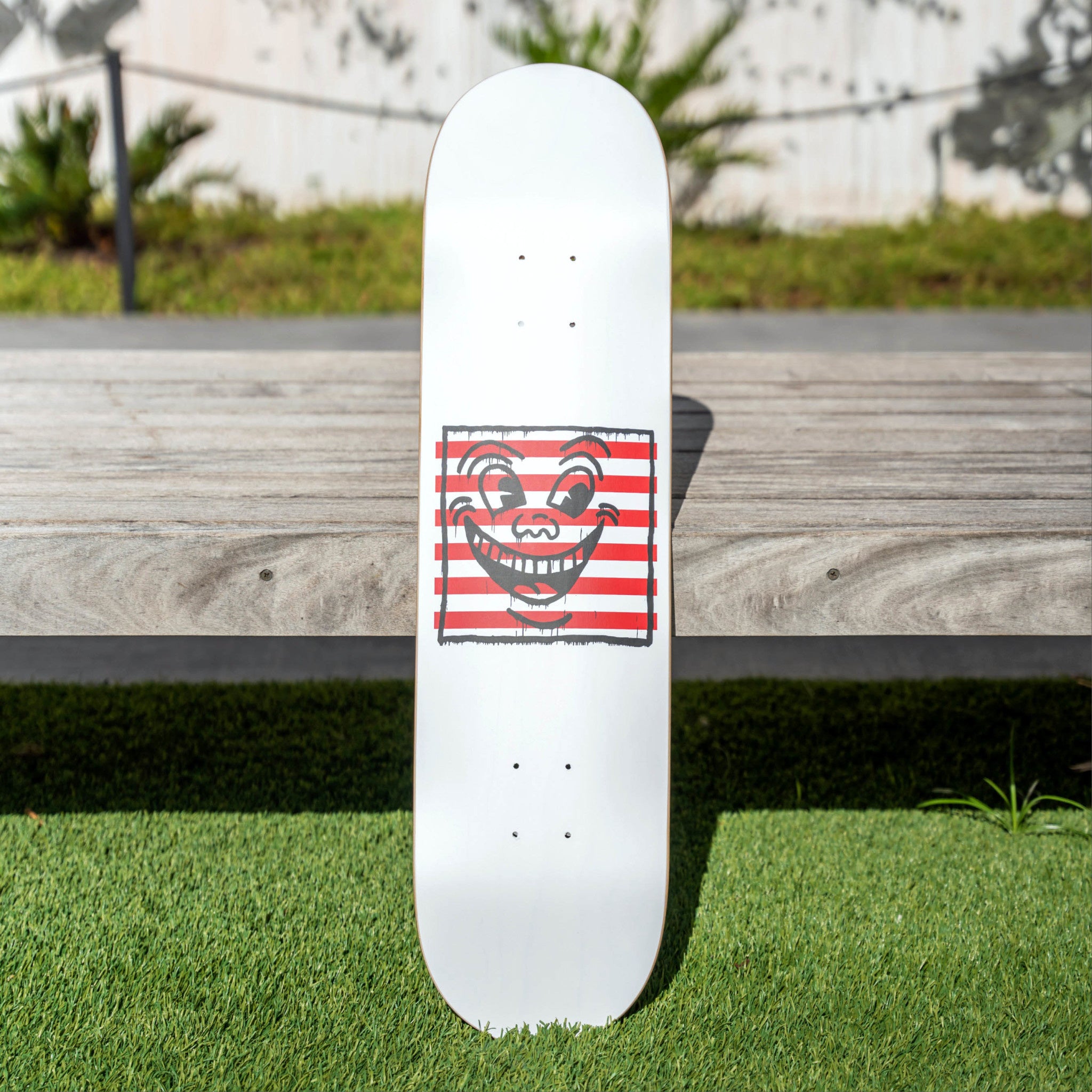 Keith Haring Smiles on Stripes Skate Deck - Wynwood Walls Shop