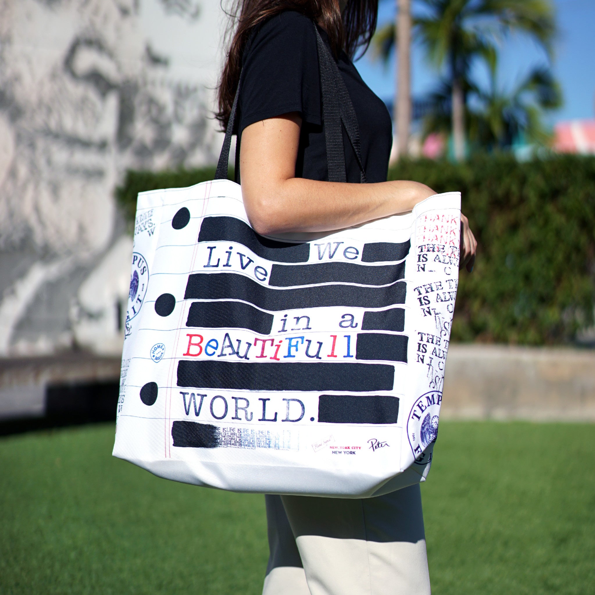 Peter Tunney WE LIVE IN A BEAUTIFUL WORLD Large Tote Bag - Wynwood Walls Shop Main image